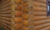 Внешняя или внутренняя отделка канатом станет прекрасным украшением бревенчатого дома